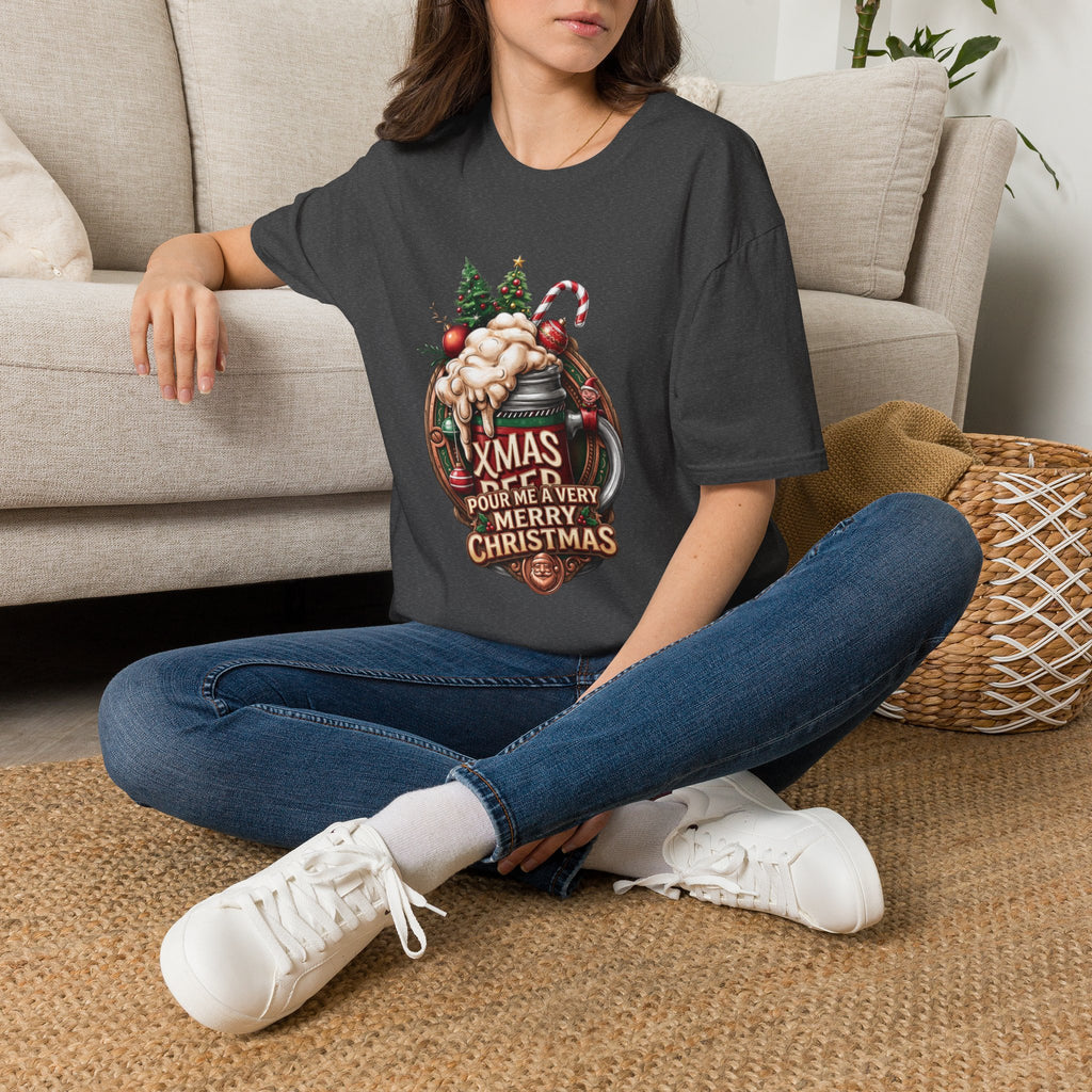 XMAS Beer Pour Me a Very Merry Christmas t-shirt in Dark Heather, worn by a woman seated on a rug