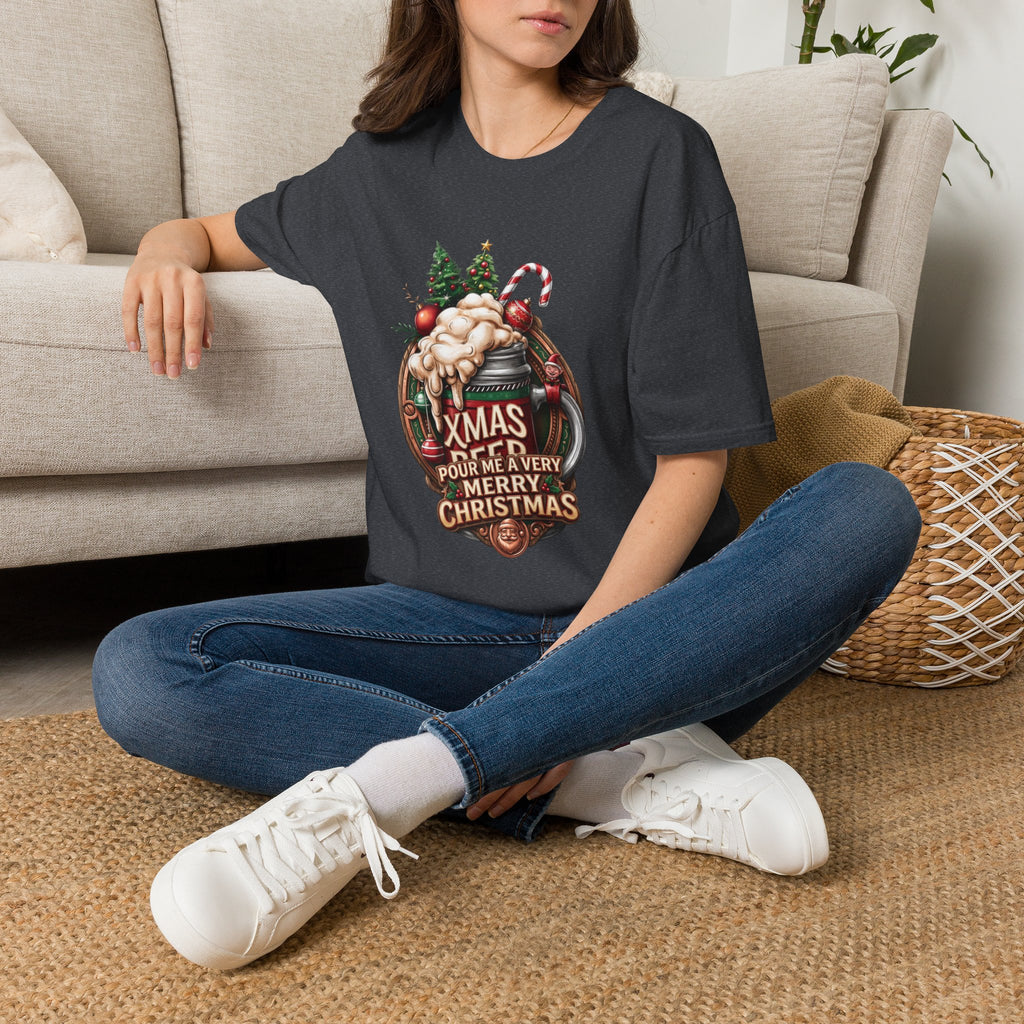 XMAS Beer Pour Me a Very Merry Christmas t-shirt in Dark Heather Grey, worn by a woman seated on a rug