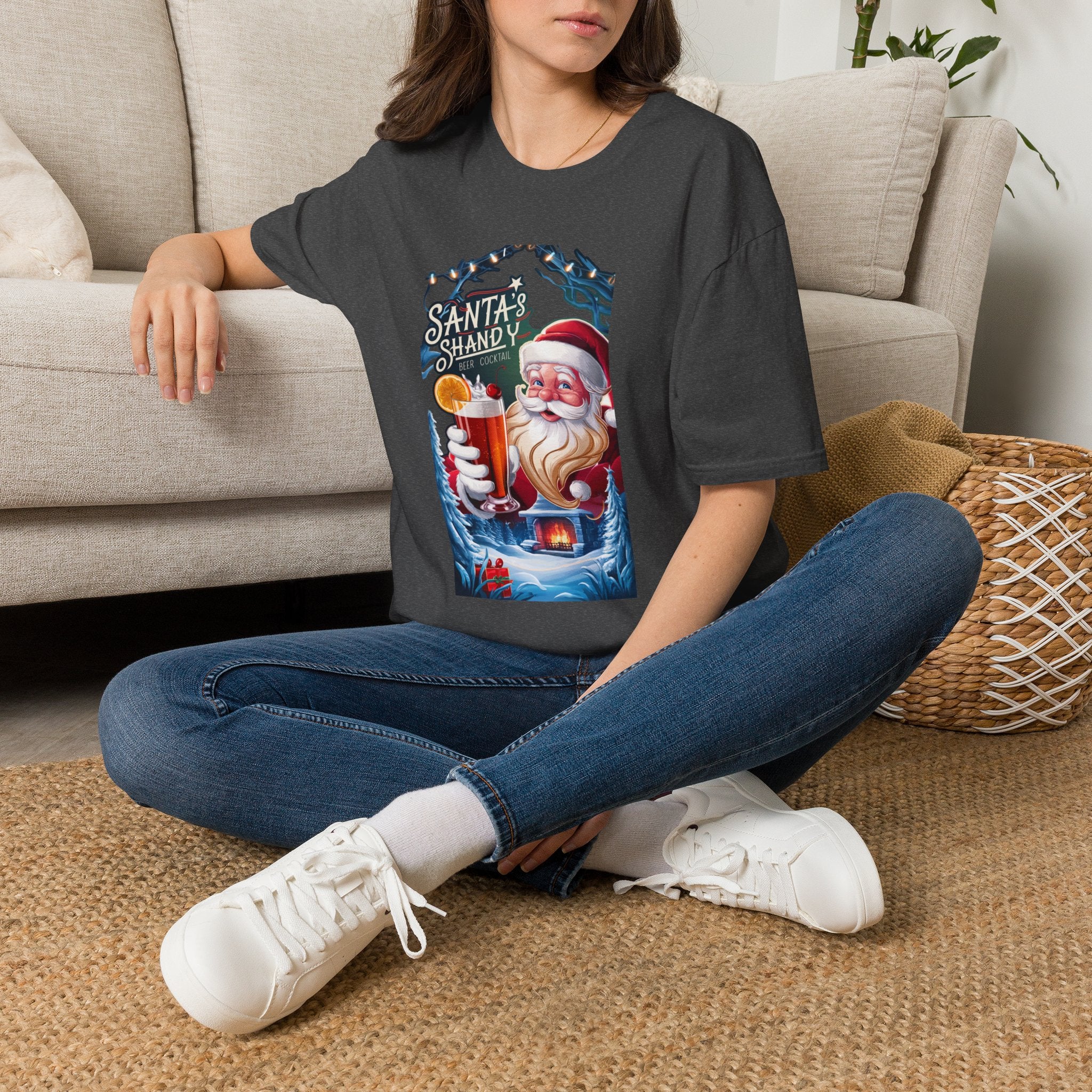 Santa's Shandy Beer Cocktail t-shirt in Dark Heather, worn by a woman seated on a rug