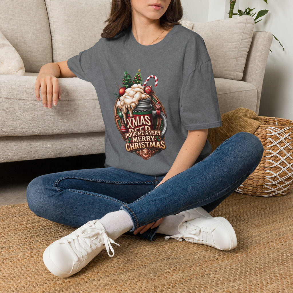 XMAS Beer Pour Me a Very Merry Christmas t-shirt in Graphite Heather, worn by a woman seated on a rug