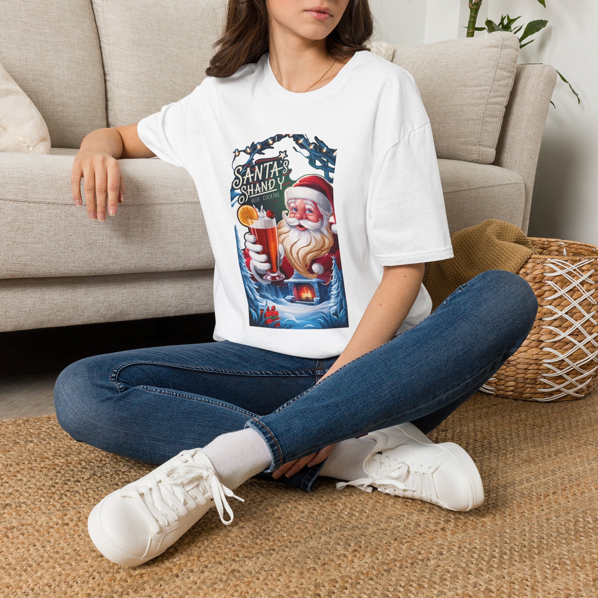 Santa's Shandy Beer Cocktail t-shirt in White, worn by a woman seated on a rug