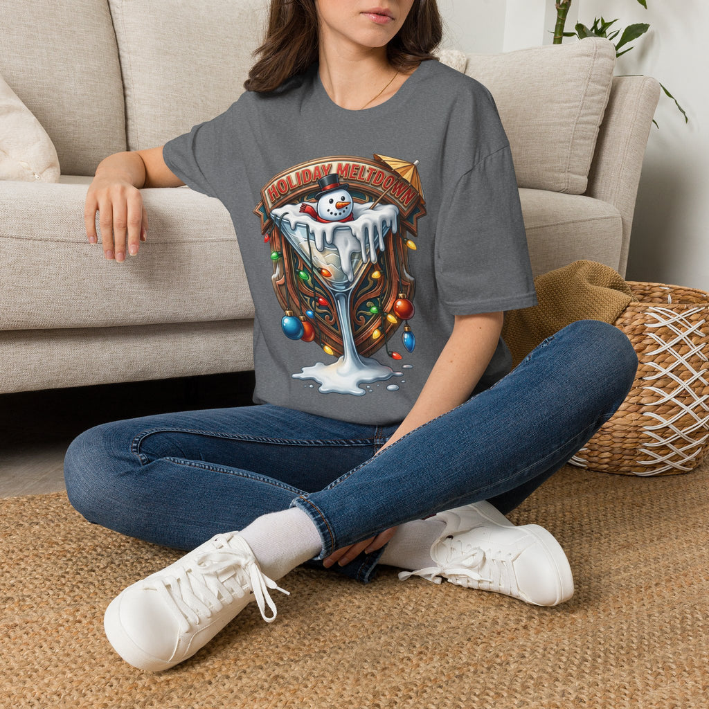 Holiday Meltdown Snowman Martini t-shirt in Graphite Heather, worn by a woman seated on a rug
