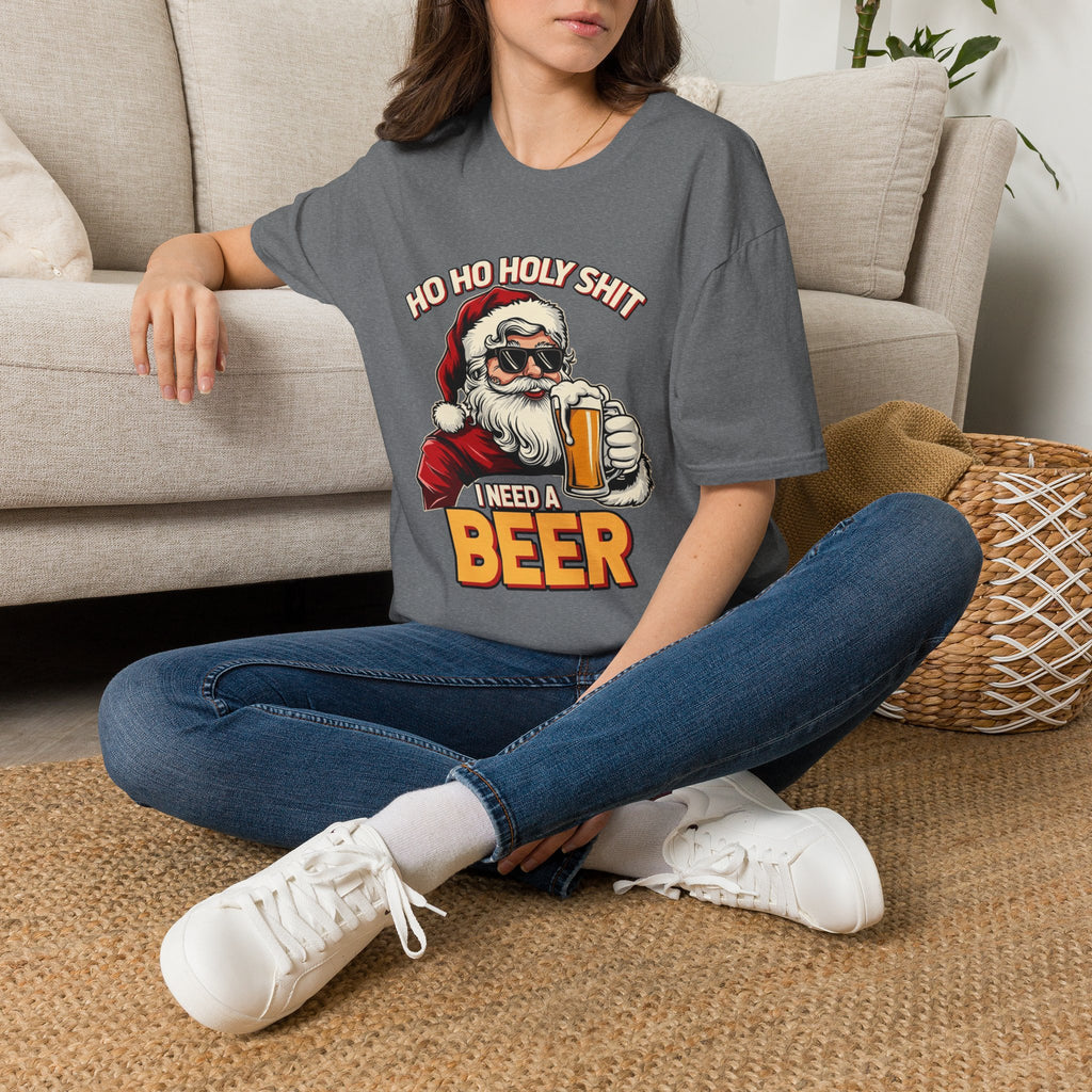 Ho Ho Holy Sh*t I Need a Beer t-shirt in Graphite Heather, worn by a woman seated on a rug