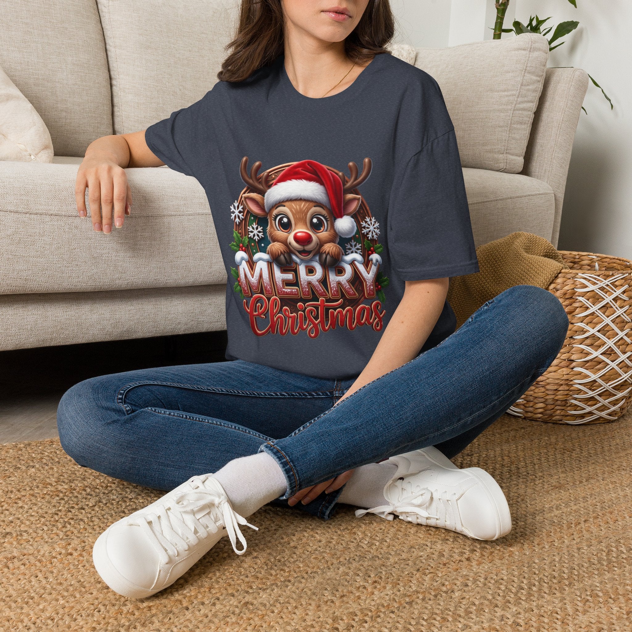 Cute Red-Nosed Reindeer t-shirt in Heather Navy, worn by a woman seated on a rug