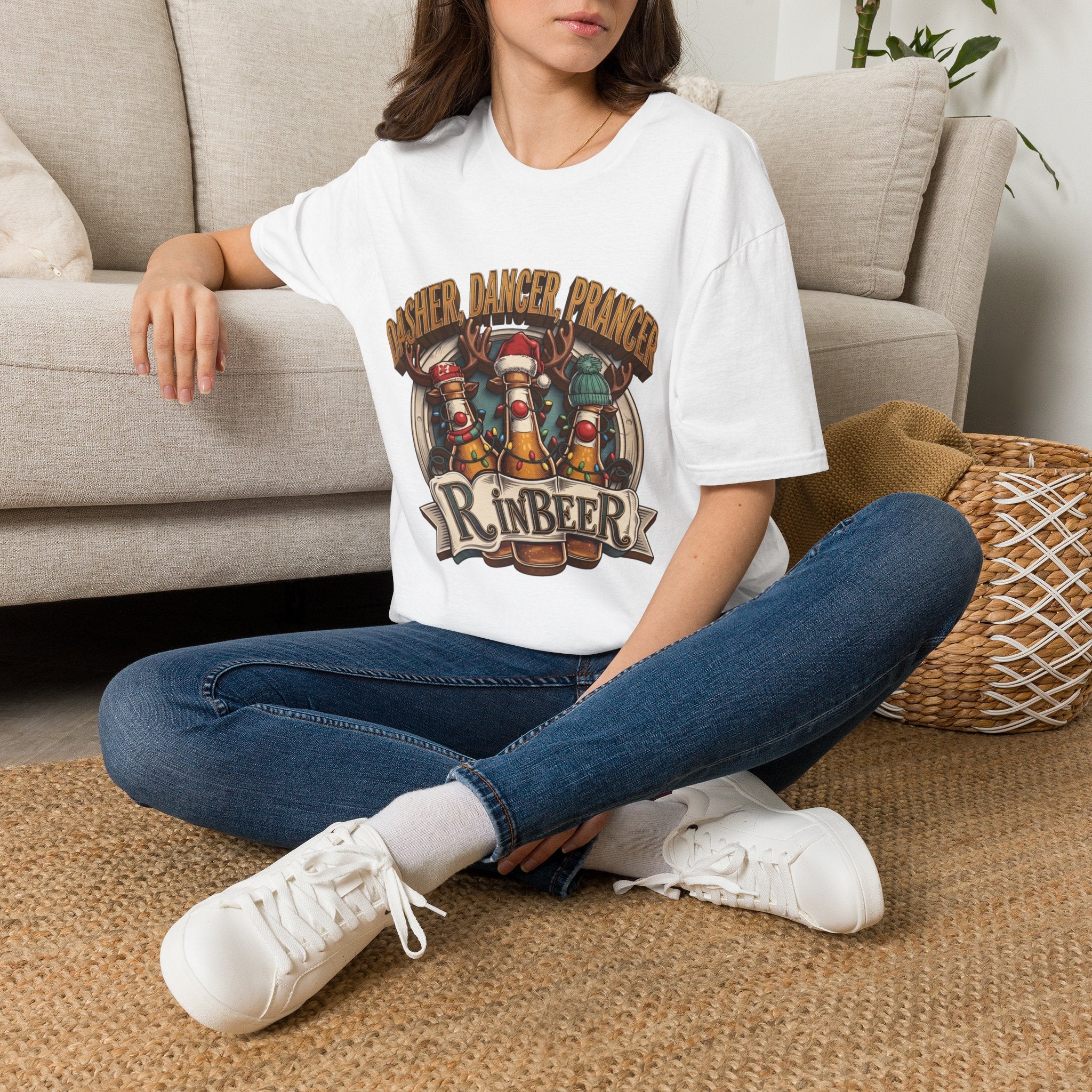Dasher Dancer Prancer Reinbeer Christmas Beer t-shirt in White, worn by a woman seated on a rug