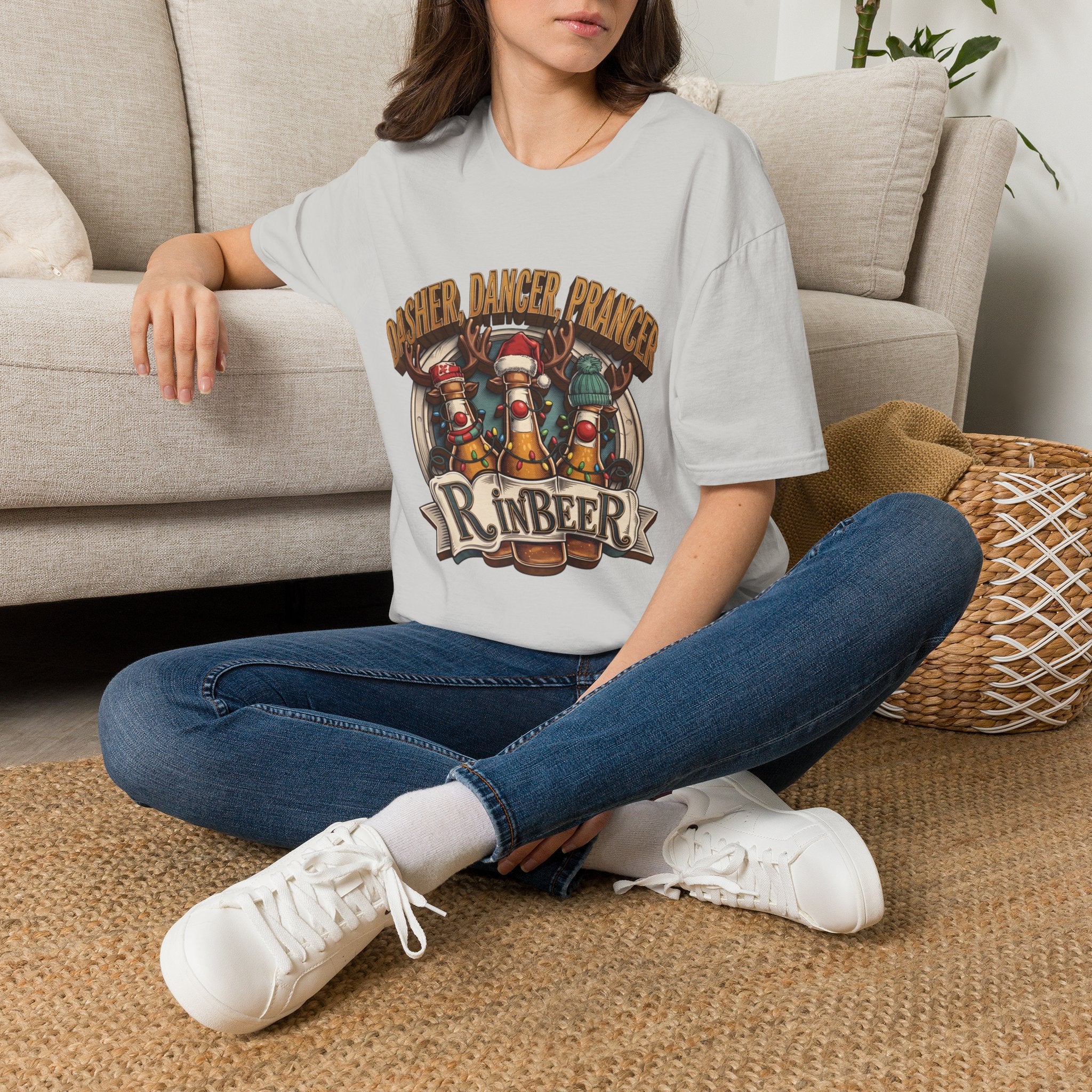 Dasher Dancer Prancer Reinbeer Christmas Beer t-shirt in Ice Grey, worn by a woman seated on a rug
