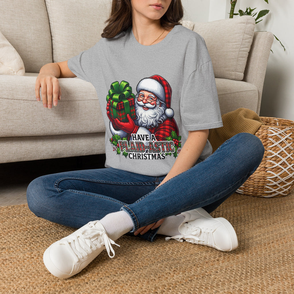 Santa Have a Plaid-astic t-shirt in Sport Grey, worn by a woman seated on a rug